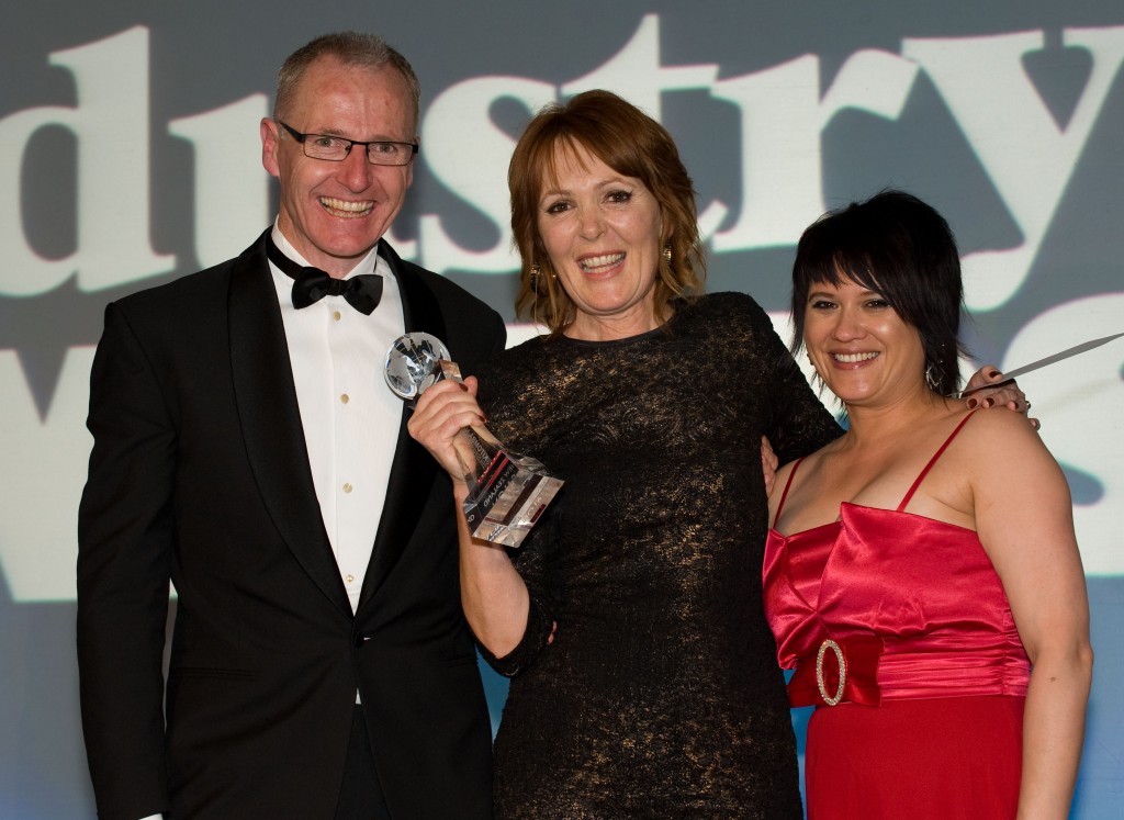 Reds Hairdressing Wins Kitomba NZARH Salon of the Year 2011 (Pictured L-R: Tom Murphy (Kitomba) Diana Beaufort (Reds Hairdressing, Ria Bond (NZARH)