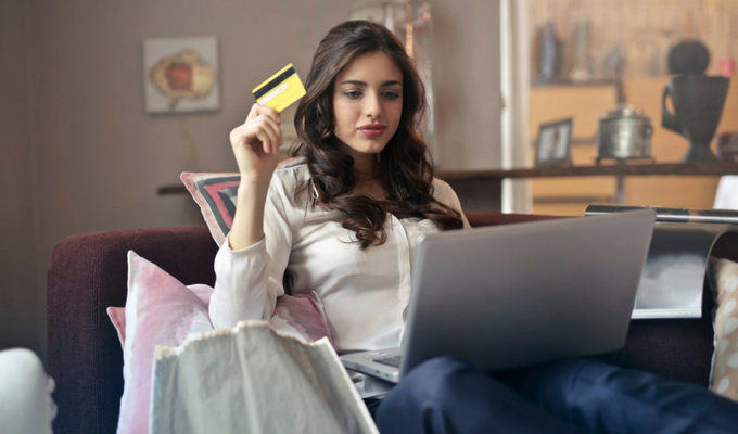Woman purchasing voucher online